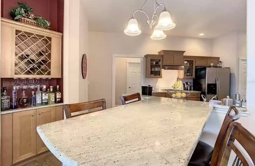 Sunridge Woods Casa | Luxury 5 Bed with POOL & SPA + Outdoor Kitchen Minutes to Disney!
