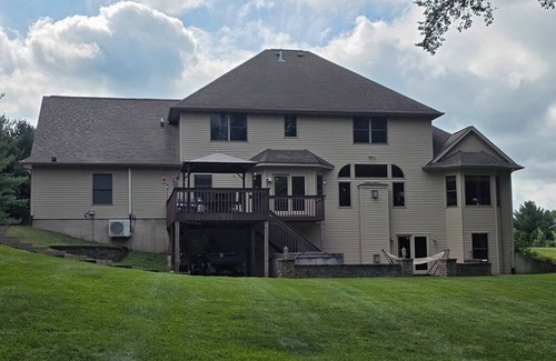 Geneseo Casa | Luxury 5 BR home on private wooded lot near QC, w/hot tub, rec & fitness room