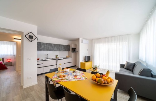 Lignano Sabbiadoro Apartamento | Alojamiento de lujo con vistas panorámicas a la laguna y al mar.