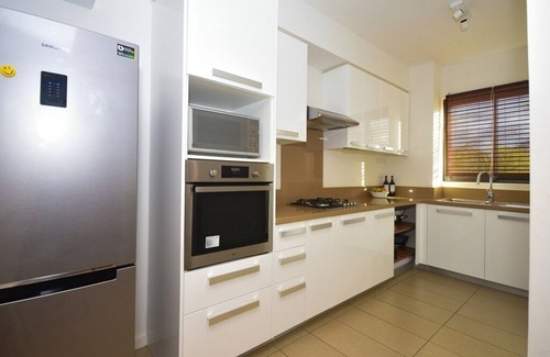 Roches Noires Apartamento | Apartamento de lujo para 6 personas. Con vistas al mar y acceso a una piscina.