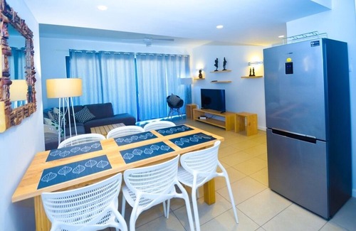 Roches Noires Apartamento | Apartamento de lujo para 6 personas. Con vistas al mar y acceso a una piscina.