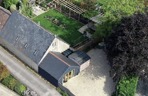 Cherhill Casa | Eclectic Barn · Pergola & Dog-Friendly Garden