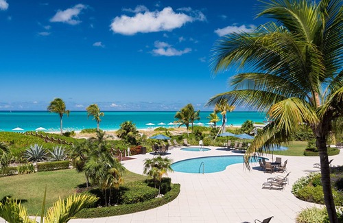 Grace Bay Condominio | Condominio de lujo frente al mar de 2 habitaciones, directamente en la playa de Grace Bay.
