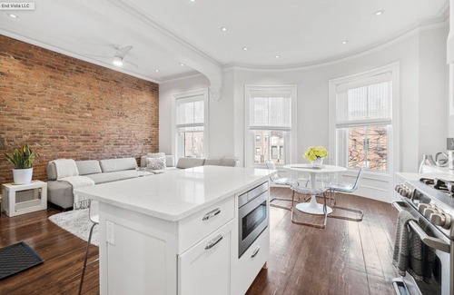 Columbus Condominio | Luxury Brownstone Condos with Private Roofdeck & Stunning City Views!