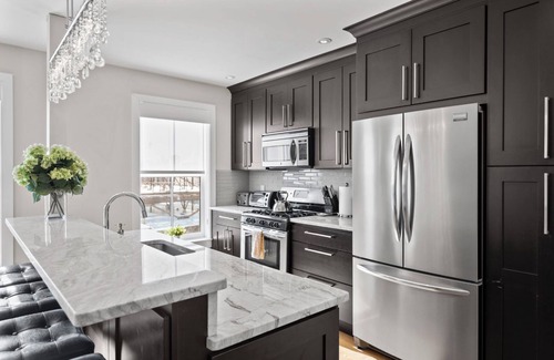 Columbus Condominio | Luxury Brownstone Condos with Private Roofdeck & Stunning City Views!