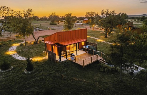 Stonewall Cabina | Luxury cabin in the center of the Texas Wine Country; large private porch w/hot tub, gas grill and fire pit; pet friendly