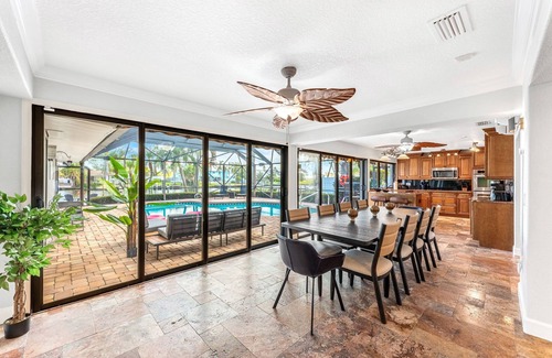 Cocoa Isles Casa | Luxury Canalfront Home w/ Heated Pool, Game Room, Boat & Jet Ski Lifts