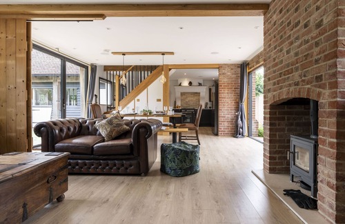 Funtington Cabaña | Luxury Cottage near West Wittering with hot tub and outdoor fireplace.