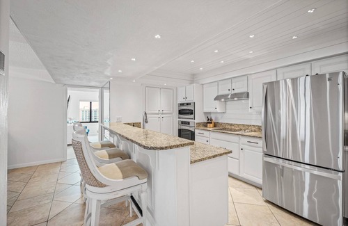 Ormond-by-the-Sea Condominio | Luxury direct oceanfront corner penthouse with heated pool and garage parking
