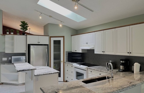 Arbour Lake Casa | Luxury Estate Bungalow in NW Calgary