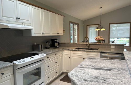 Arbour Lake Casa | Luxury Estate Bungalow in NW Calgary