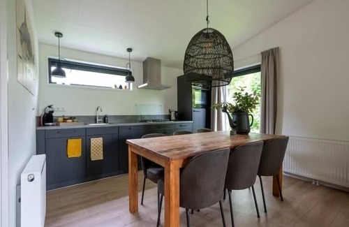 Pingjum Casa | Luxury holiday cottage, stunning views, and hot tub.