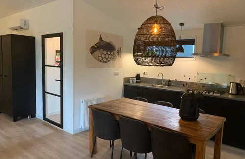 Pingjum Casa | Luxury holiday cottage, stunning views, and hot tub.