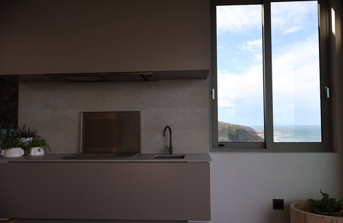 George Casa | Luxury house in Herolds Bay. Stunning ocean views. Hiking, cycling and golf.