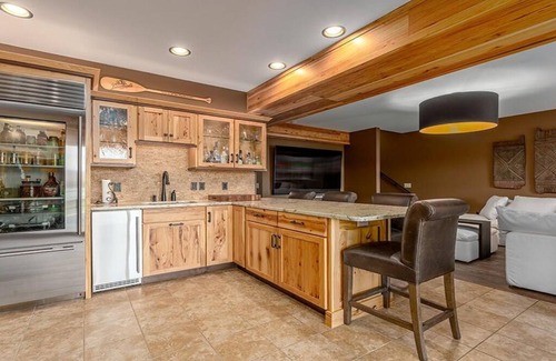 Chippewa Falls Casa | Luxury House on Lake Wissota w/Private Beach, Docks, Hot Tub, Fire Pit and More