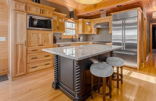 Chippewa Falls Casa | Luxury House on Lake Wissota w/Private Beach, Docks, Hot Tub, Fire Pit and More