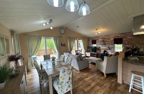 Tattershall Cabina | luxury lakeside lodge with a sunken hot tub on bull rush a peaceful feature lake @Tattershall lakes