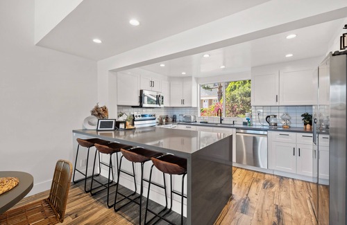 Central Malibu Casa | Luxury Malibu retreat with sweeping views, balconies, pool, and tennis court