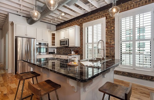 Central City Apartamento | Luxury Penthouse with Private Deck and Indoor Parking