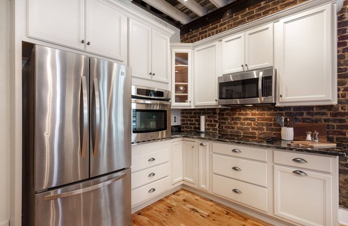Central City Apartamento | Luxury Penthouse with Private Deck and Indoor Parking