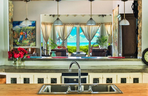 Palm Island Casa | Casa tropical de lujo frente al mar, totalmente equipada con impresionantes vistas y comodidades