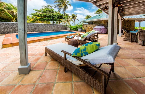 Palm Island Casa | Casa tropical de lujo frente al mar, totalmente equipada con impresionantes vistas y comodidades