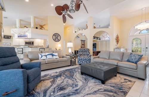 Burnt Store Isles Casa | Luxury Tropical long waterfront view w/bikes,kayaks,golf clubs,beach gear incl.
