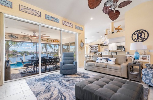 Burnt Store Isles Casa | Luxury Tropical long waterfront view w/bikes,kayaks,golf clubs,beach gear incl.