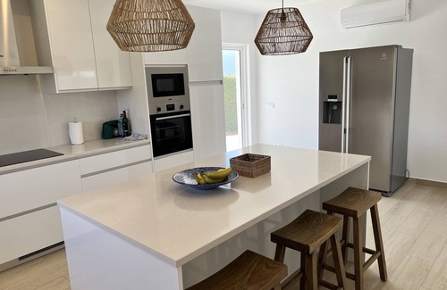 Mato Serrao Villa | Villa de lujo en Carvoeiro con piscina climatizada, vistas fantásticas al mar y Gran Jardín