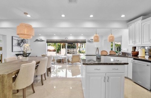 Garden Isles Casa | Luxury Waterfront house/ Heated pool in paradise