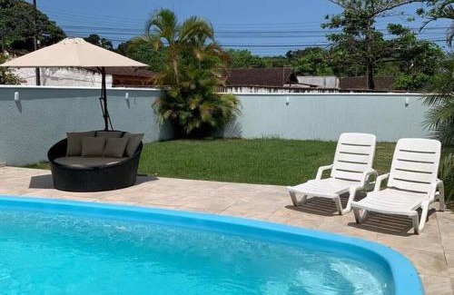 Matinhos Casa | M&M House - Casa com Piscina e Ar Condicionado em Matinhos