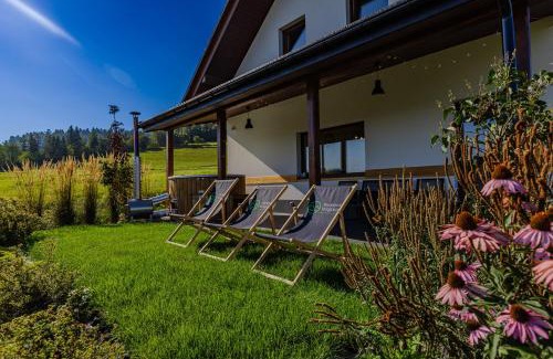 Ponice Apartamento | Maciejowe Wzgórze Domek z dwoma niezależnymi apartamentami ze SPA - Sauna, Jacuzzi, Tężnia, Izba Solna i Solankowa, Balia na wyłączność z hydromasażami