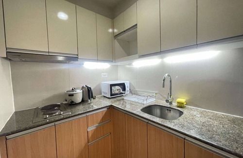 Lapu-Lapu Condominio | Mactan Newtown Family Suite Room