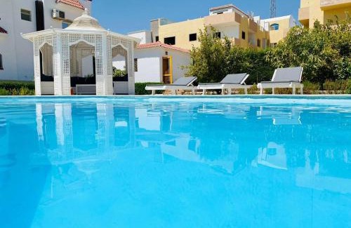 Village Road Villa | Magawish villa in the heart of the city