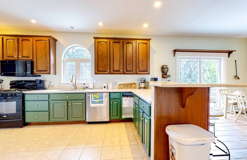 Holden Casa | Maine Country Getaway | Creekside house in Holden with deck & great location