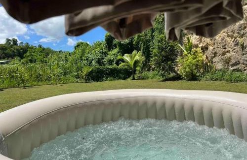 Point d'Or Casa | Maison chaleureuse aux Abymes avec jacuzzi relaxant