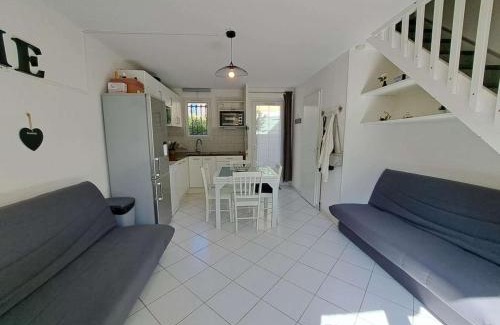 Marseillan Plage Apartamento | Maison mitoyenne climatisée 7 pers. avec piscine et parking à Marseillan-Plage - FR-1-326-848