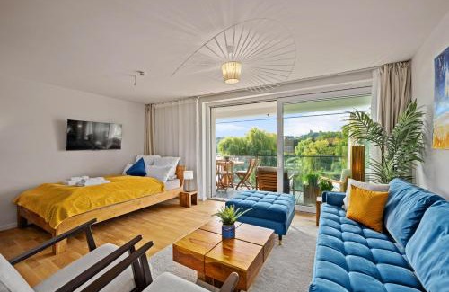 Moelln Apartamento | MAISUITES Eisvogel - Zentrale Luxuswohnung mit direktem Seeblick I Bis 4 Personen I Premiumküche I Boxspringbett I Kaffeevollautomat I Parkplatz I Barrierearm & Aufzug