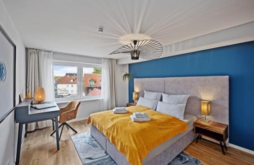 Moelln Apartamento | MAISUITES Eisvogel - Zentrale Luxuswohnung mit direktem Seeblick I Bis 4 Personen I Premiumküche I Boxspringbett I Kaffeevollautomat I Parkplatz I Barrierearm & Aufzug