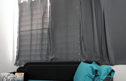 Sabana Abajo Casa | Mami's Corner in Carolina with WiFi, AC, Near Airport, Beaches, Malls and more