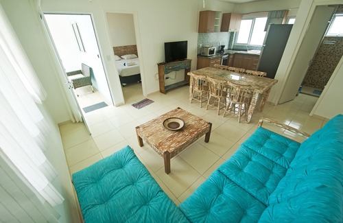 Pilar Apartamento | Manga Verde Beach 04: Vista de la piscina y la playa H