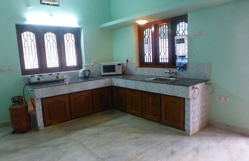 Thiruvananthapuram Villa | Gestionado y mantenido por una pareja británica. Planta baja de una hermosa Villa.