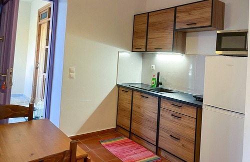 East Mani Apartamento | Mani familiar, casa de montaña con estacionamiento