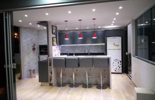 Muquem Casa | Mansão Red Park Floripa