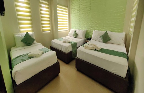 Puerto Princesa City Centre Hotel | Manuela Suites Puerto Princesa near Airport