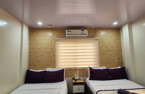 Puerto Princesa City Centre Hotel | Manuela Suites Puerto Princesa near Airport