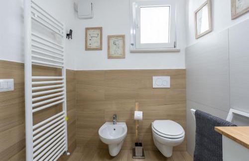 Ferro di Cavallo Apartamento | MaRì Studio Flat - Posto auto e Metro - ItalyWeGo