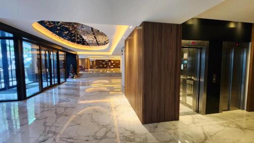 Zona de La Perla Apartamento | MarDelSuites - Studio Premium Piso 14 a Pasos del Mar, Amenities, Seguridad 24hrs, Cochera Opcional