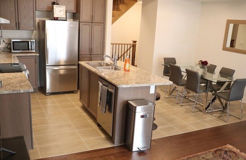 Markham Casa | Markham home near Toronto with dual patios, bright