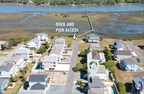 Holden Beach Casa | Marsh Mellowed by the Sea Brunswick Vacation Rentals Privated heated pool and beach